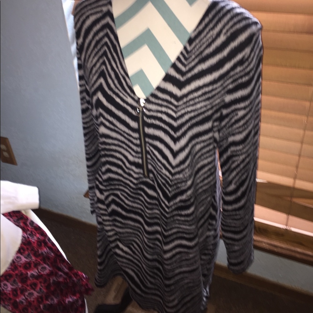 Gorgeous zebra print, quarter zip with MK emblem